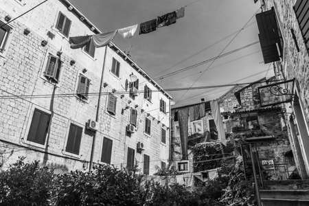 SPLIT, CROATIA, 7 AUGUST 2019: Clothes hanging between old buildings in the historic centerのeditorial素材