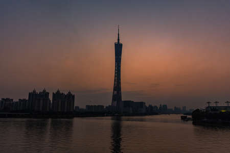 GUANGZHOU, CHINA, 18 NOVEMBER 2019: Cityscape with the Canton Tower on sunsetのeditorial素材