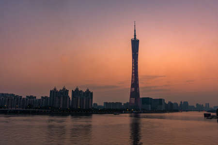 GUANGZHOU, CHINA, 18 NOVEMBER 2019: Cityscape with the Canton Tower on sunsetのeditorial素材