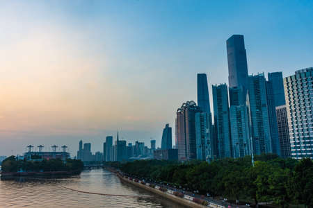 GUANGZHOU, CHINA, 18 NOVEMBER 2019: Cityscape with the Canton Tower on sunsetのeditorial素材
