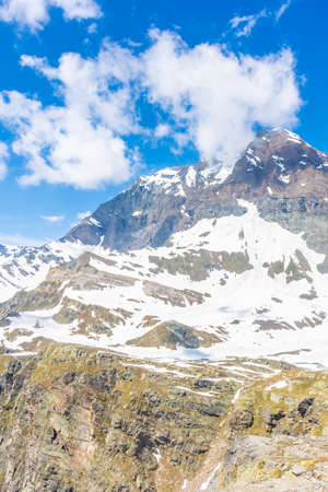 Alpine landscape of the snowy mountains of the border between Italy and France