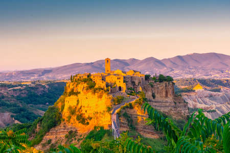 Beautiful sunset over Civita di Bagnoregio, Lazio, Italyの写真素材