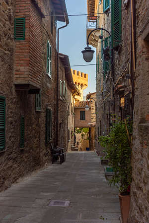 Medieval street in the historic center of Passignano, town in Umbria, Italyの写真素材