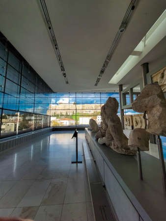 ATHENS, GREECE, 12 DECEMBER 2021: Interior of the modern Acropolis Museum with ancient greek findingsのeditorial素材