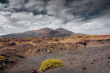 Wild volcanic landscape of Los Volcanes Natural Park in Lanzarote, Canary Islands, Spainの写真素材