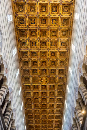 Pisa, Italy, 14 April 2022: Golden ceiling of Pisa Cathedral
