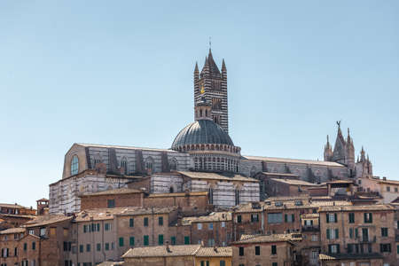 Cityscape of Siena historic center with the Cathedral, Tuscany, Italyの写真素材
