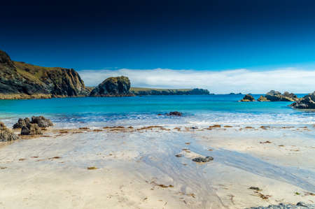 Amazing Kynance Cove beach with crystal clear water in Cornwall, England