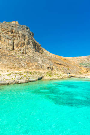 Amazing crystal clear water on the shoreline of Gramvousa Island, Crete, Greeceの写真素材