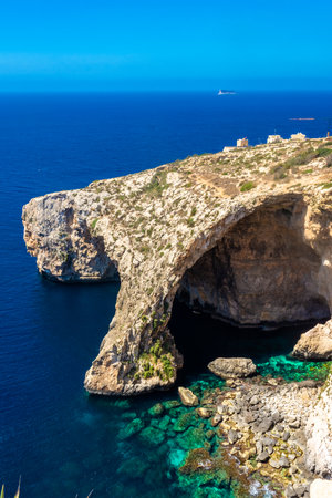 The Blue Grotto of Malta, rock formation on the sea with crystal clear waterの写真素材
