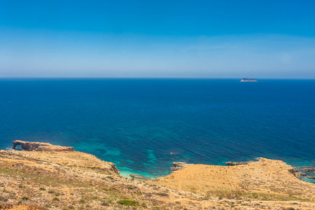 Crystal clear turquoise water down the Dingli Cliffs, Maltaの写真素材
