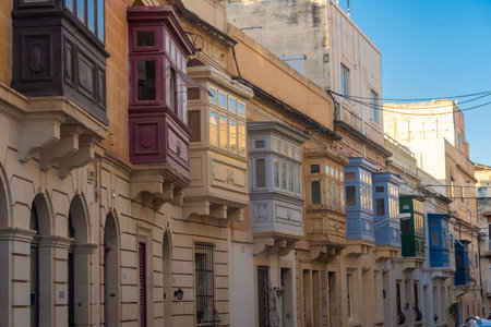 Typical maltese colorful balconies in a street of Sliema, Maltaの写真素材