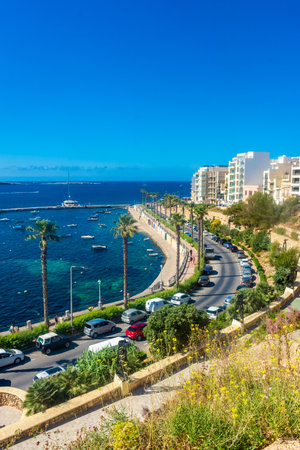 Bugibba, Malta, 22 May 2022: View of the harbor and the promenadeのeditorial素材