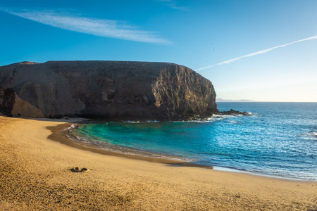 Beautiful sunset over the Atlantic Ocean at Papagayo Beach, Lanzarote, Canary Islands, Spainの写真素材