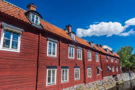 Colorful houses by the canal in the city center of Vasteras, Swedenの写真素材
