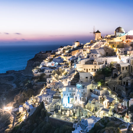 Stunning sunset over Oia village in Santorini, Greeceの写真素材