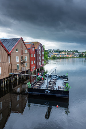 Beautiful view of the colorful wooden buildings of Trondheim Canal, Norwayの写真素材