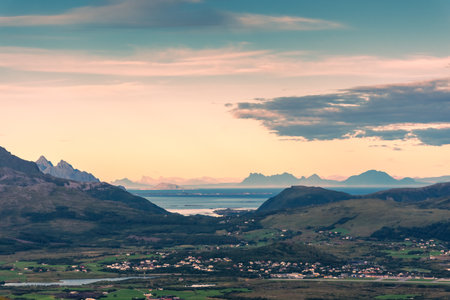 Beautiful landscape of the Lofoten Islands during the golden hour, view from Offersoy Mount trail, Norwayの写真素材