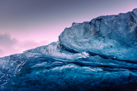 Detail of the ice caves of Vatnajokull Glacier at sunrise, Icelandの写真素材