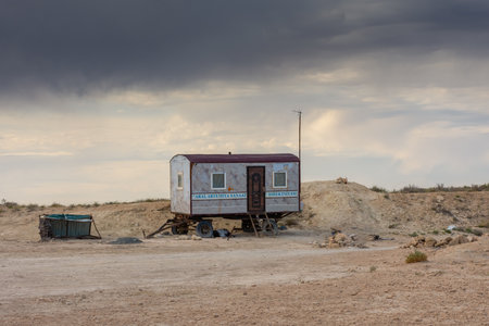 Aral Sea, Uzbekistan, 16 August 2023: Abandoned trailer in the desertの写真素材