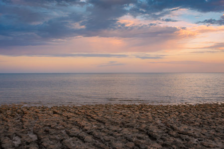 Horizon of the Aral Lake at sunsetの写真素材