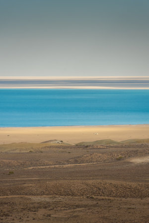 Layers of desert, salt marsh and water of the Aral Lake, Uzbekistanの写真素材