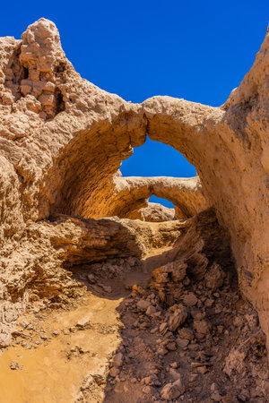 Ancient arches of the Ayaz Kala Fortress in the Kyzylkum Desert, Uzbekistanの写真素材