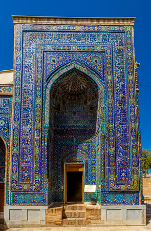 View of the Shah-i-Zinda Ensemble in Samarkand, Uzbekistan. Mausoleums decorated by blue tiles with designs. The necropolis is a popular tourist attraction of Central Asia.の写真素材