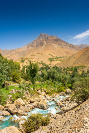 The beautiful valley of the Fann Mountains, Seven Lakes hiking trail, Tajikistanの写真素材
