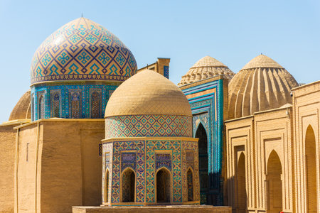 View of the Shah-i-Zinda Ensemble in Samarkand, Uzbekistan. Mausoleums decorated by blue tiles with designs. The necropolis is a popular tourist attraction of Central Asia.の写真素材