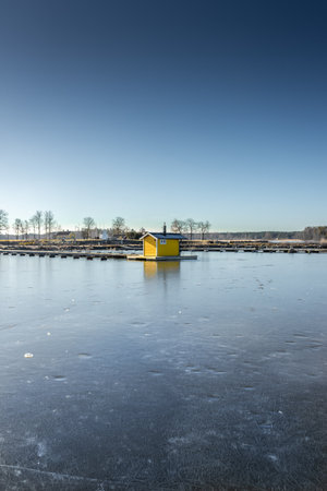Winter landscape of the frozen Sjotorp Lake, Gota Canal, Swedenの写真素材