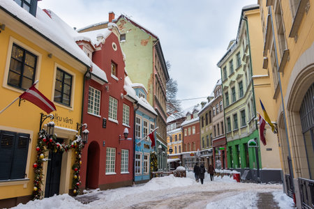 Riga, Latvia, 2 December 2023: Snowy streets of Riga historic center in winterの写真素材