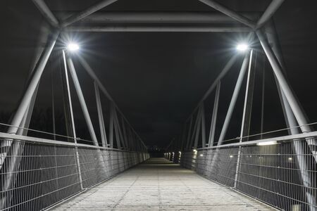 Night shot of a bridge in Regensburg, Bavaria, Germanyの写真素材