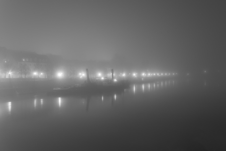 Night shot of Regensburg and Danube river with fogの写真素材