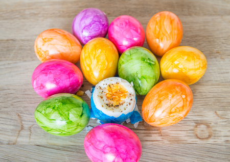 Colorful easter eggs with salt and pepperの写真素材