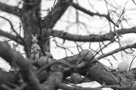 Colorful easter eggs and easter bunny on a tree