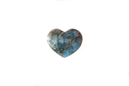Heart made of precious stone in front of white backgroundの写真素材