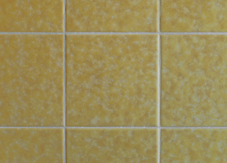 Nostalgic yellow wall tiles from the seventiesの写真素材
