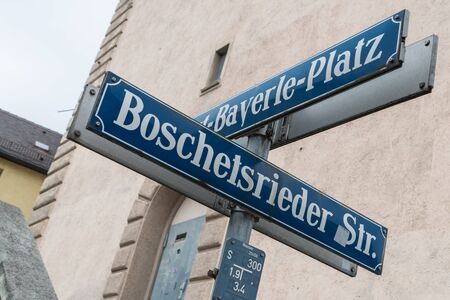 Street sign of the Boschetsrieder street and Albert Bayerle Place in Munichの写真素材