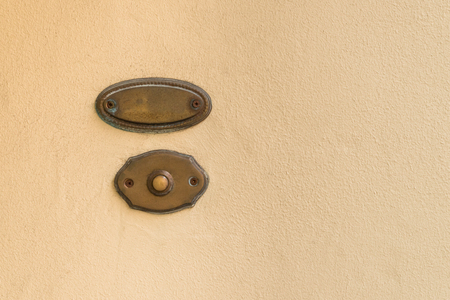 Old vintage door bell with empty name plate