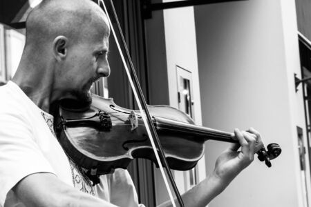 Luebeck, Germany, June 19, 2017, Street musician at the pedestrian zone in Luebeckのeditorial素材