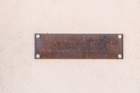 Empty rusty iron name plateの写真素材