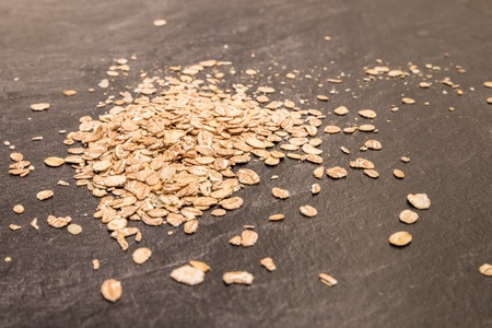 Cereal flakes on gray surfaceの写真素材