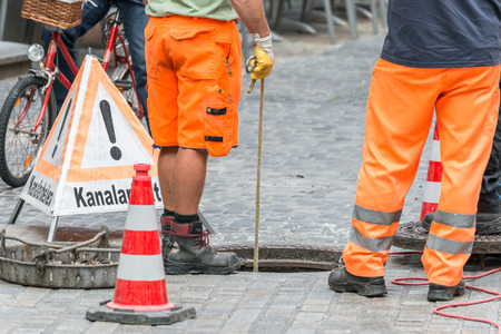 StreetWorks on the road with a warning signの写真素材