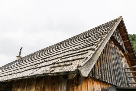 Wood shingle on a roof at an alpine cabin, Austriaの写真素材