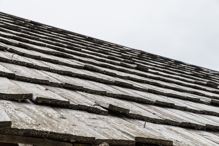 Wood shingle on a roof at an alpine cabin, Austriaの写真素材