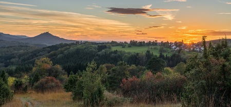 Sunset at autumn with view to the castle Hohenzollern, Germanyの写真素材