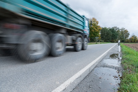 Truck passing by on a national highway, Germanyの写真素材