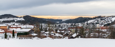 View to the snow covered Grafenau in the Bavarian Forest with view to the Alps, Bavaria, Germanyの写真素材