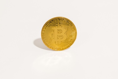 Gold coin bitcoin isolated on white backgroundの写真素材